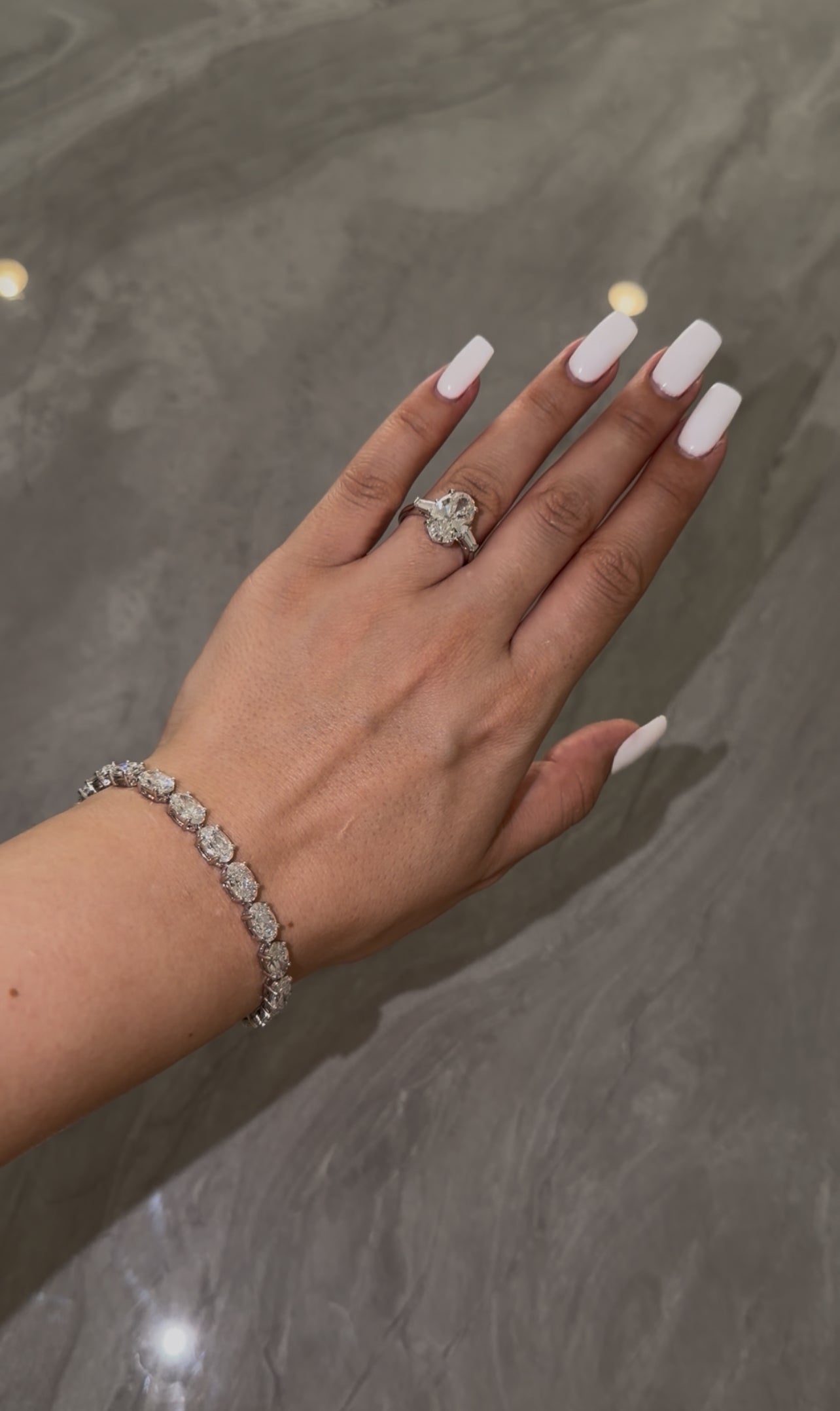 4CT OVAL DIAMOND RING WITH SIDE