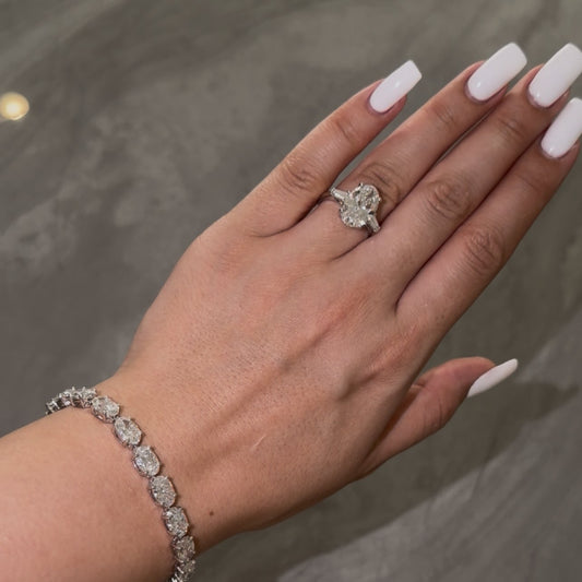 4CT OVAL DIAMOND RING WITH SIDE