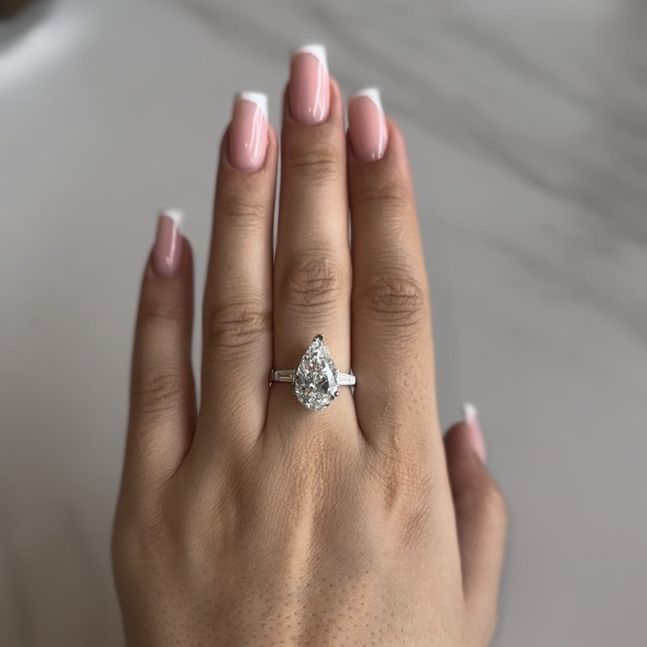 8 CT PEAR DIAMOND RING WITH SIDE BAGUETTE