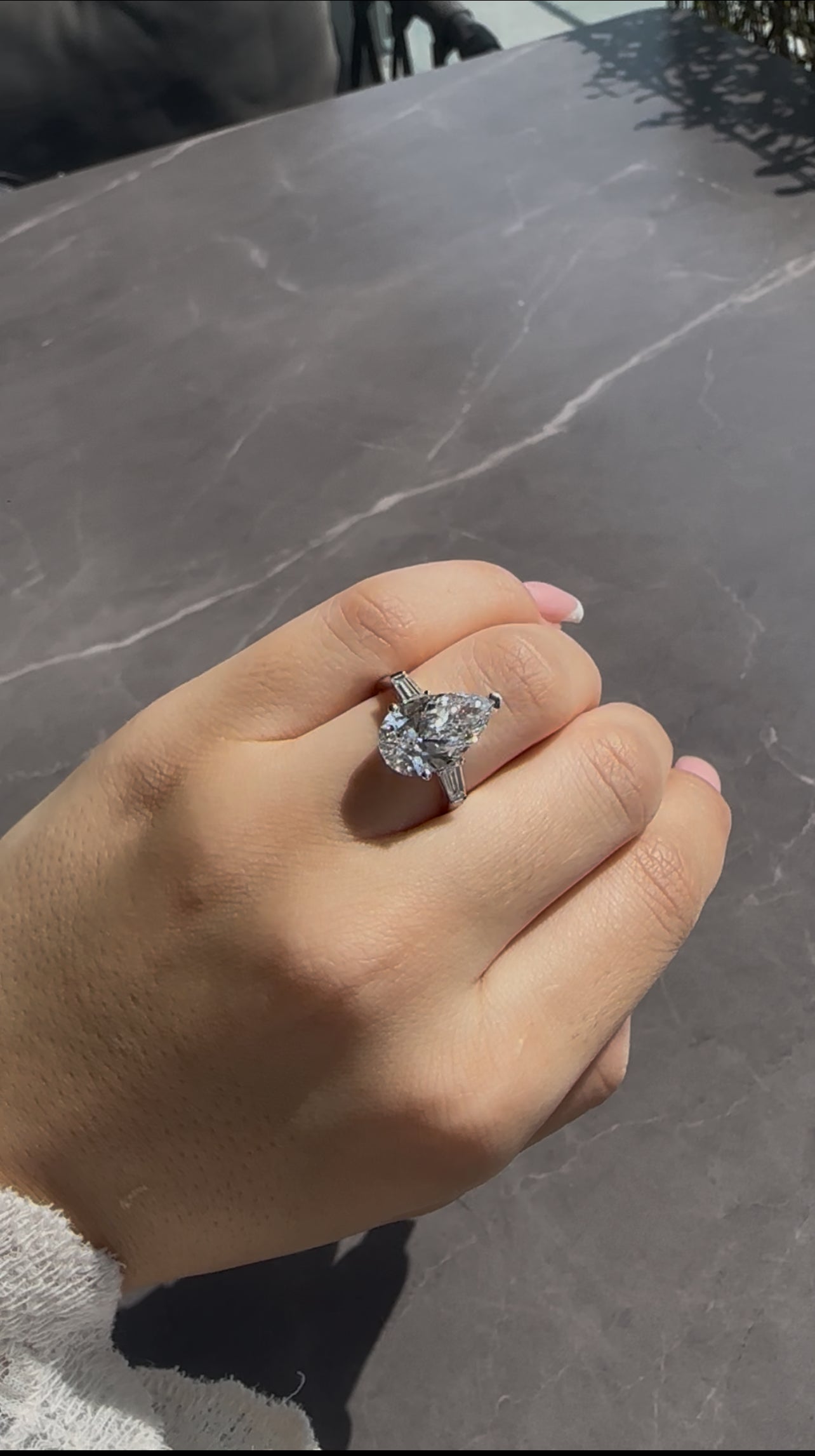 8 CT PEAR DIAMOND RING WITH SIDE BAGUETTE