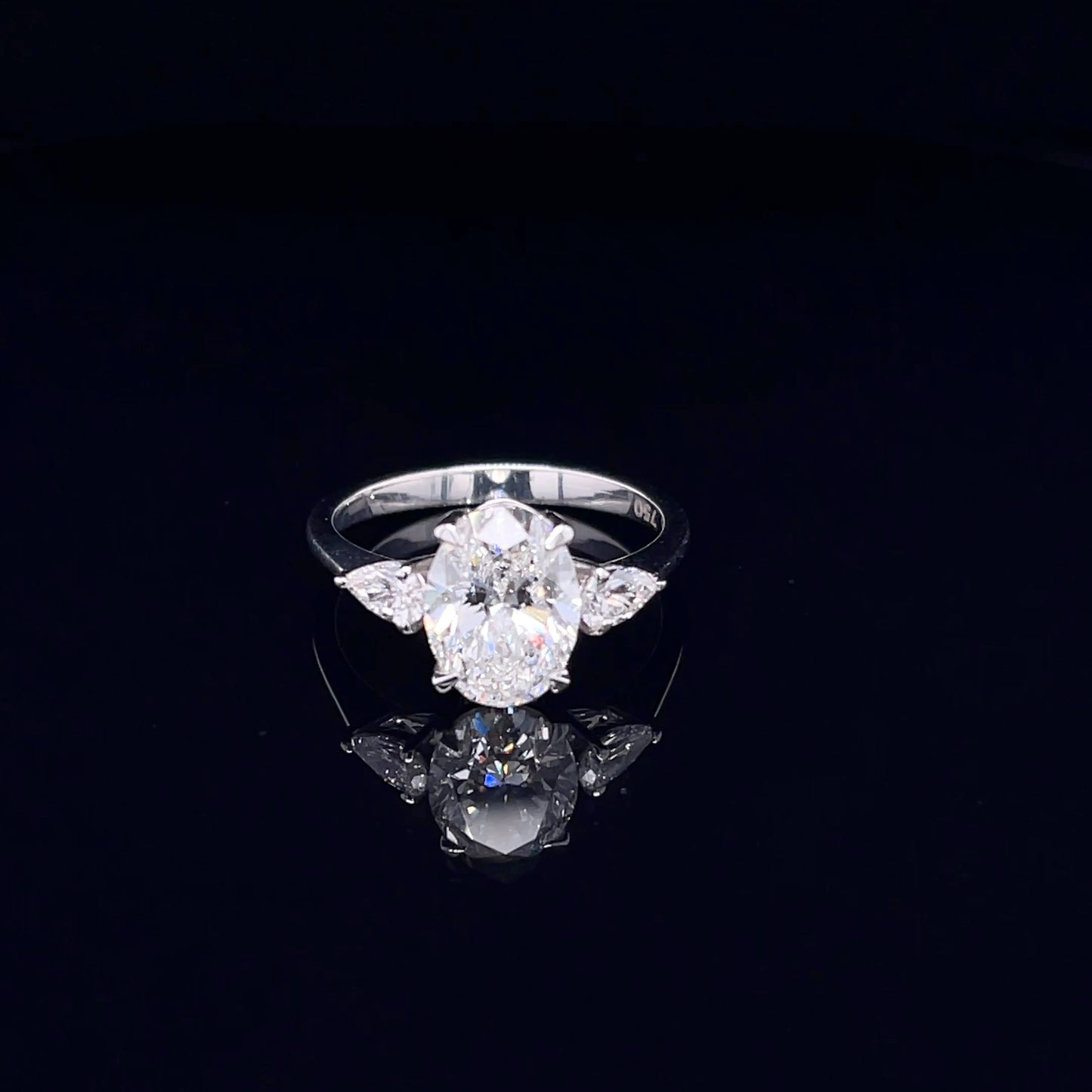 2 Carat Oval with Side Pear Ring (ARJS3142)