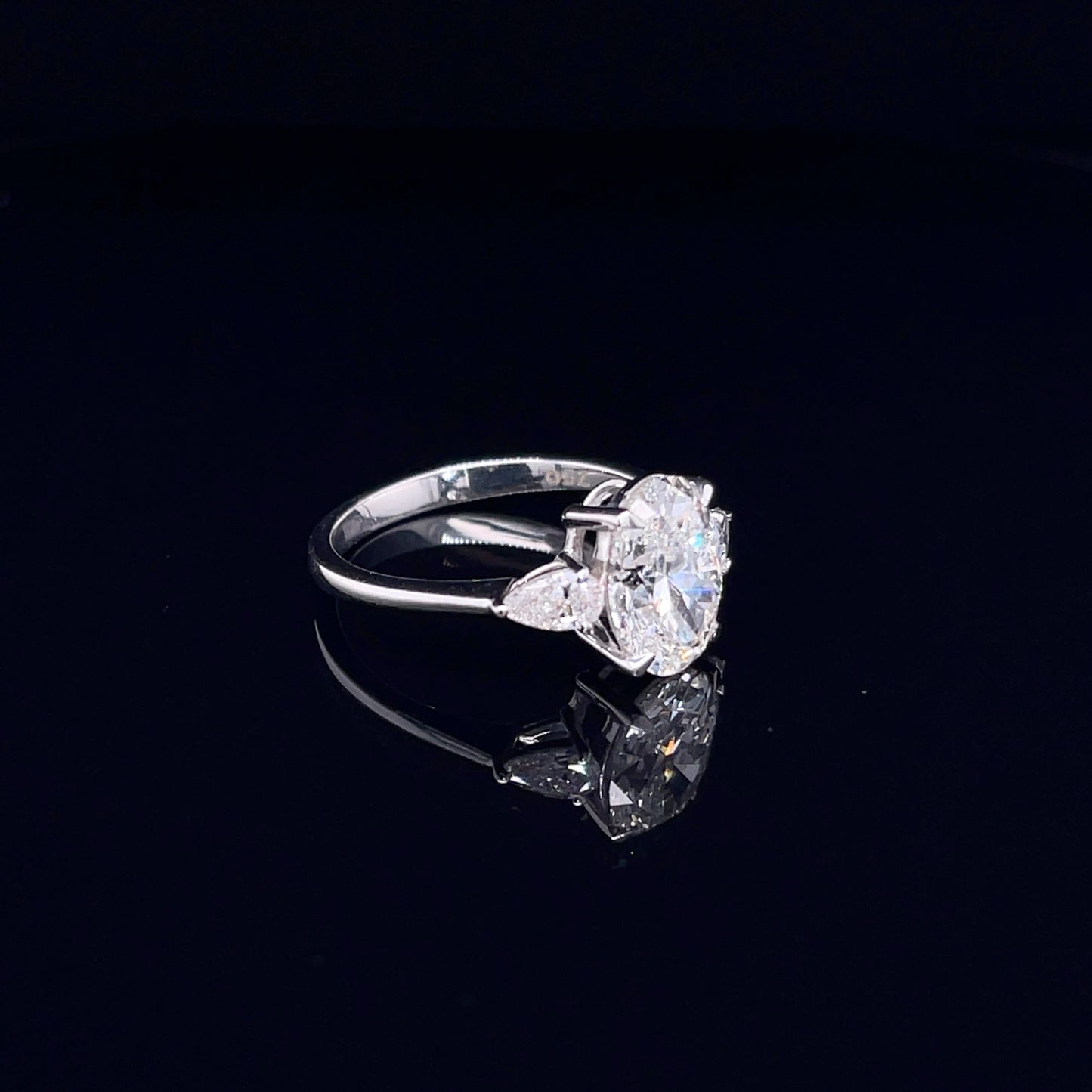 2 Carat Oval with Side Pear Ring (ARJS3142)