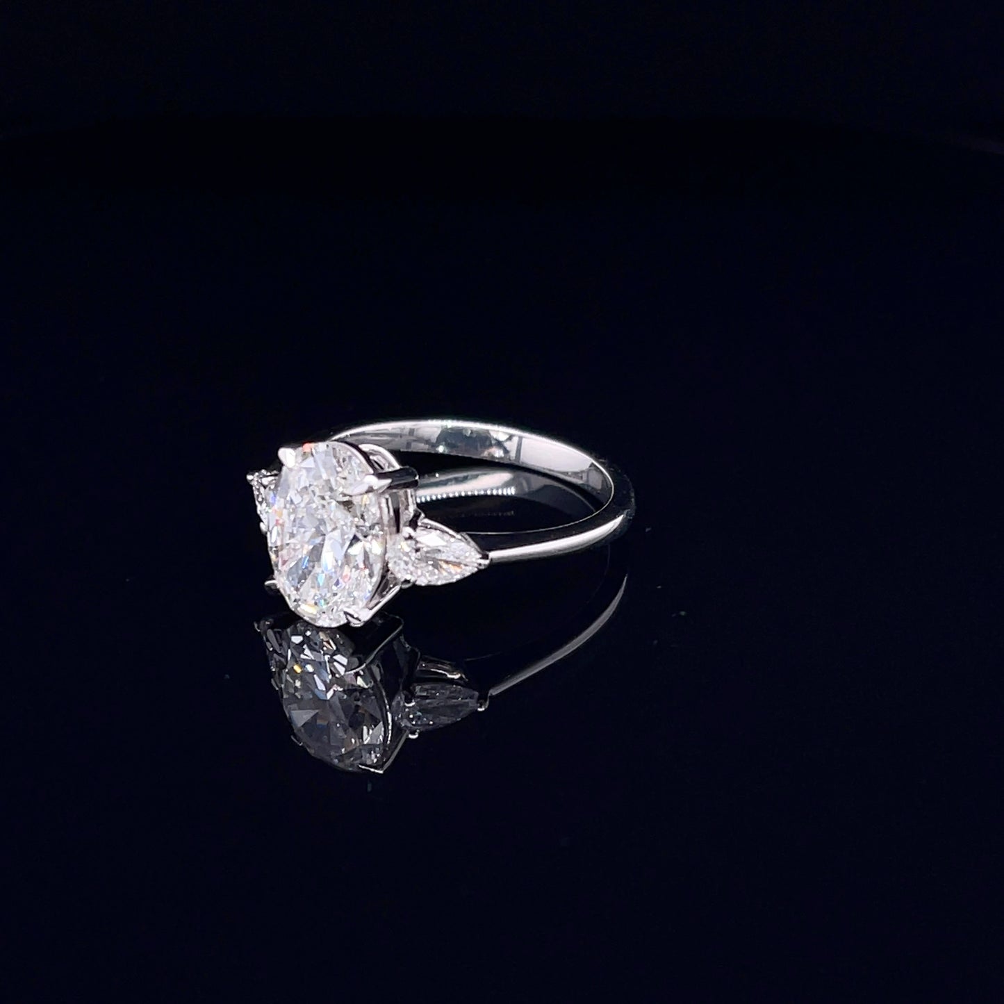 2 Carat Oval with Side Pear Ring (ARJS3142)