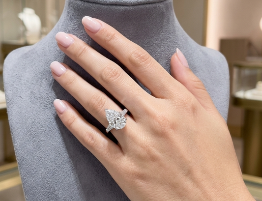 8 CT PEAR DIAMOND RING WITH SIDE BAGUETTE