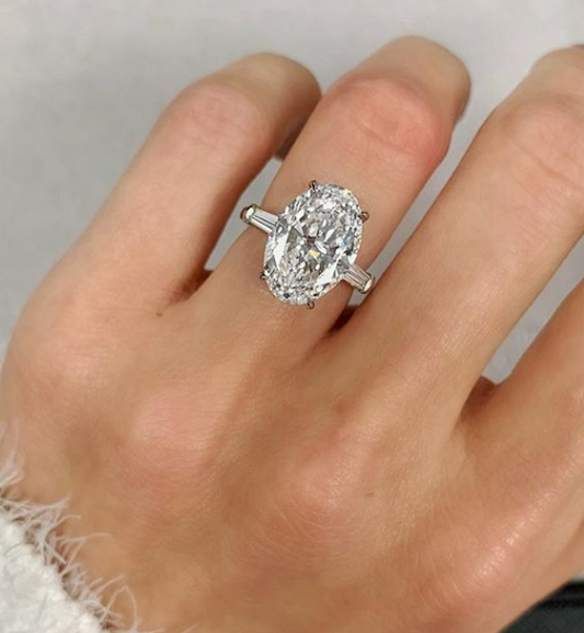 4CT OVAL DIAMOND RING WITH SIDE